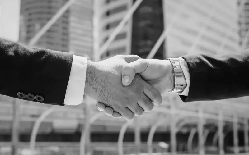 Business agreement handshake